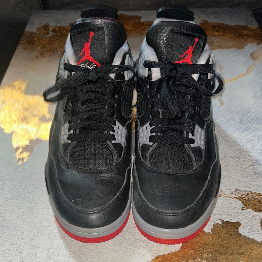 Jordan Black and Red Air Jordan 4 Sneakers